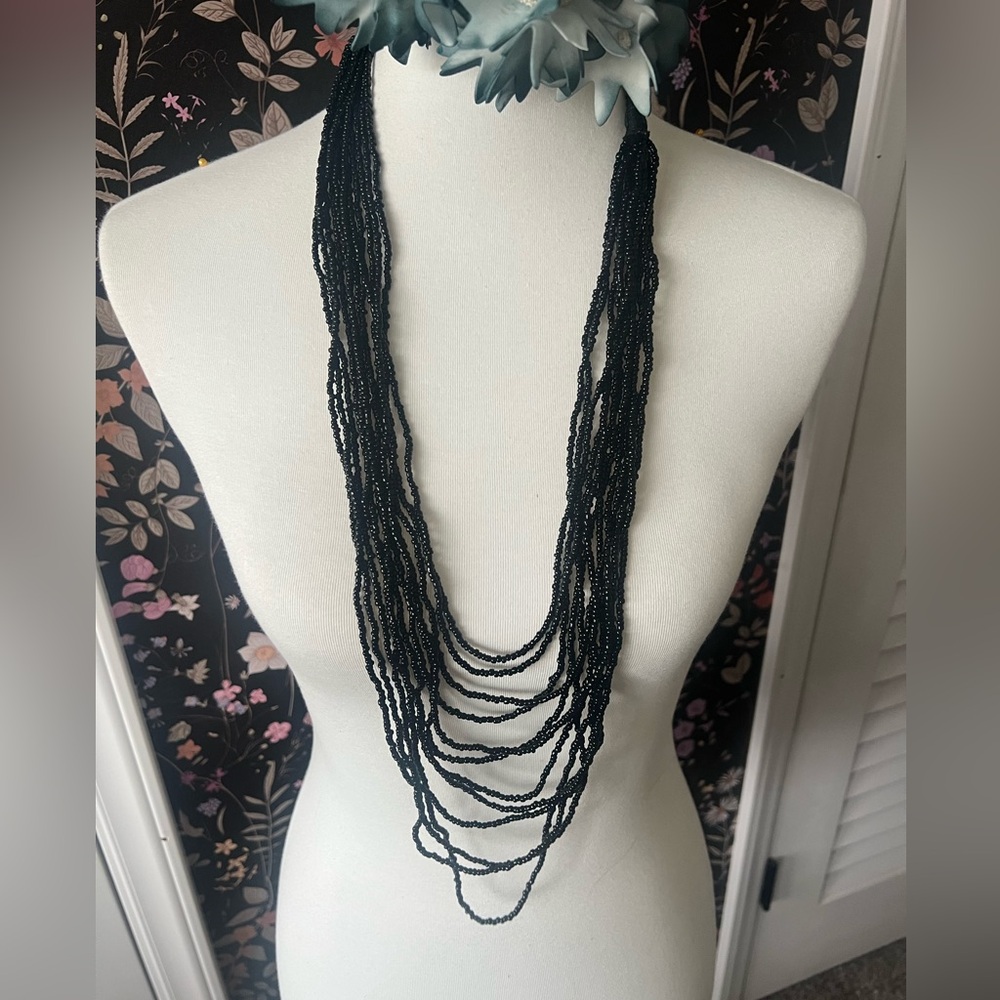 Long black beaded necklace
